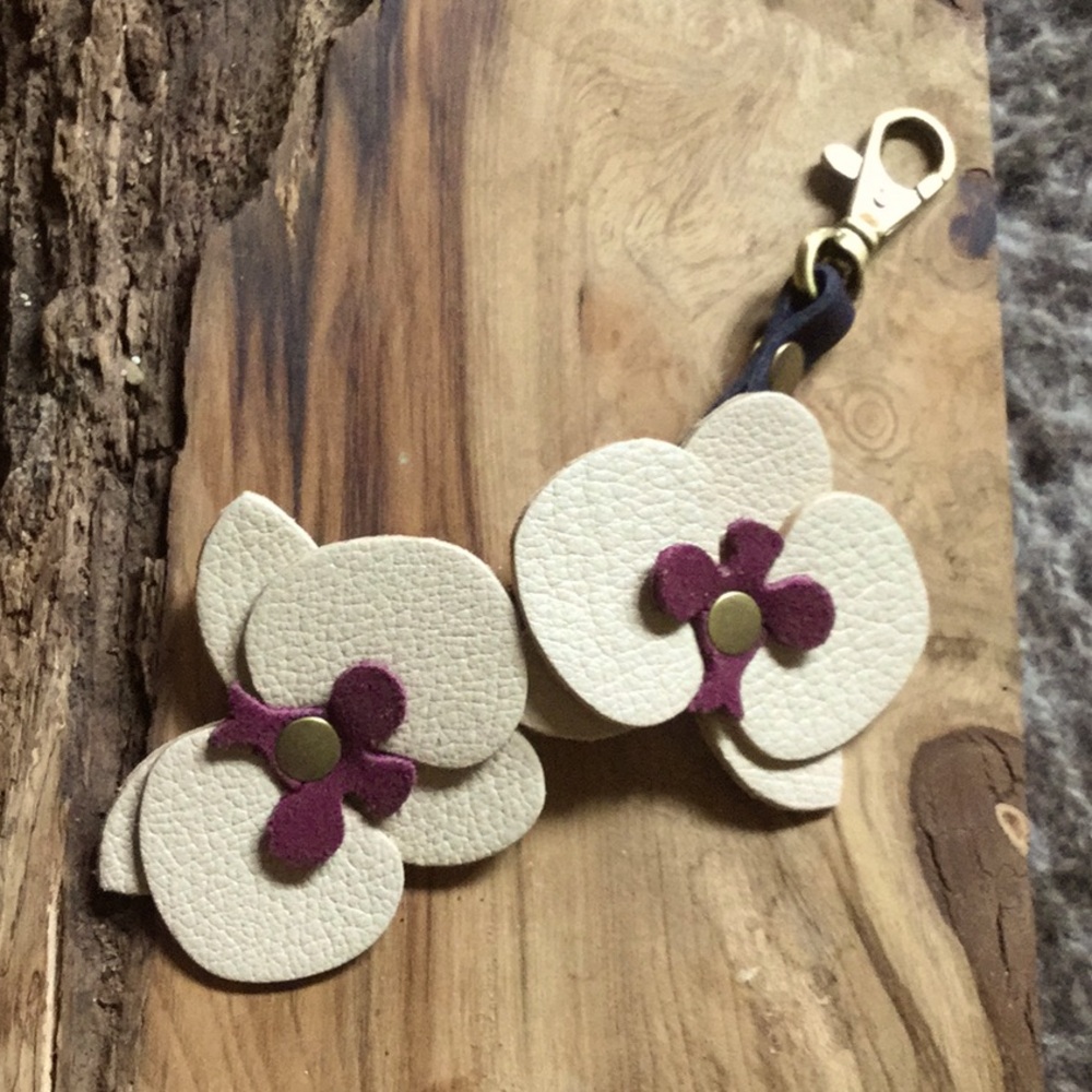 Portland leather goods bag clip on floral botanical garden art festival rodeo
